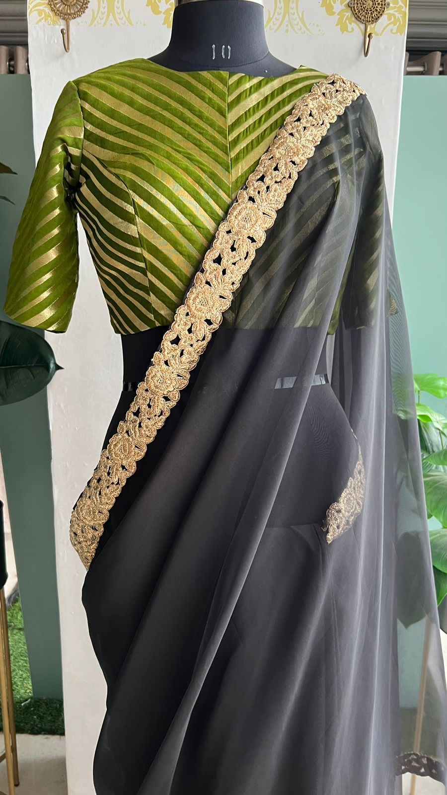 Black organza saree with olive banarasi blouse