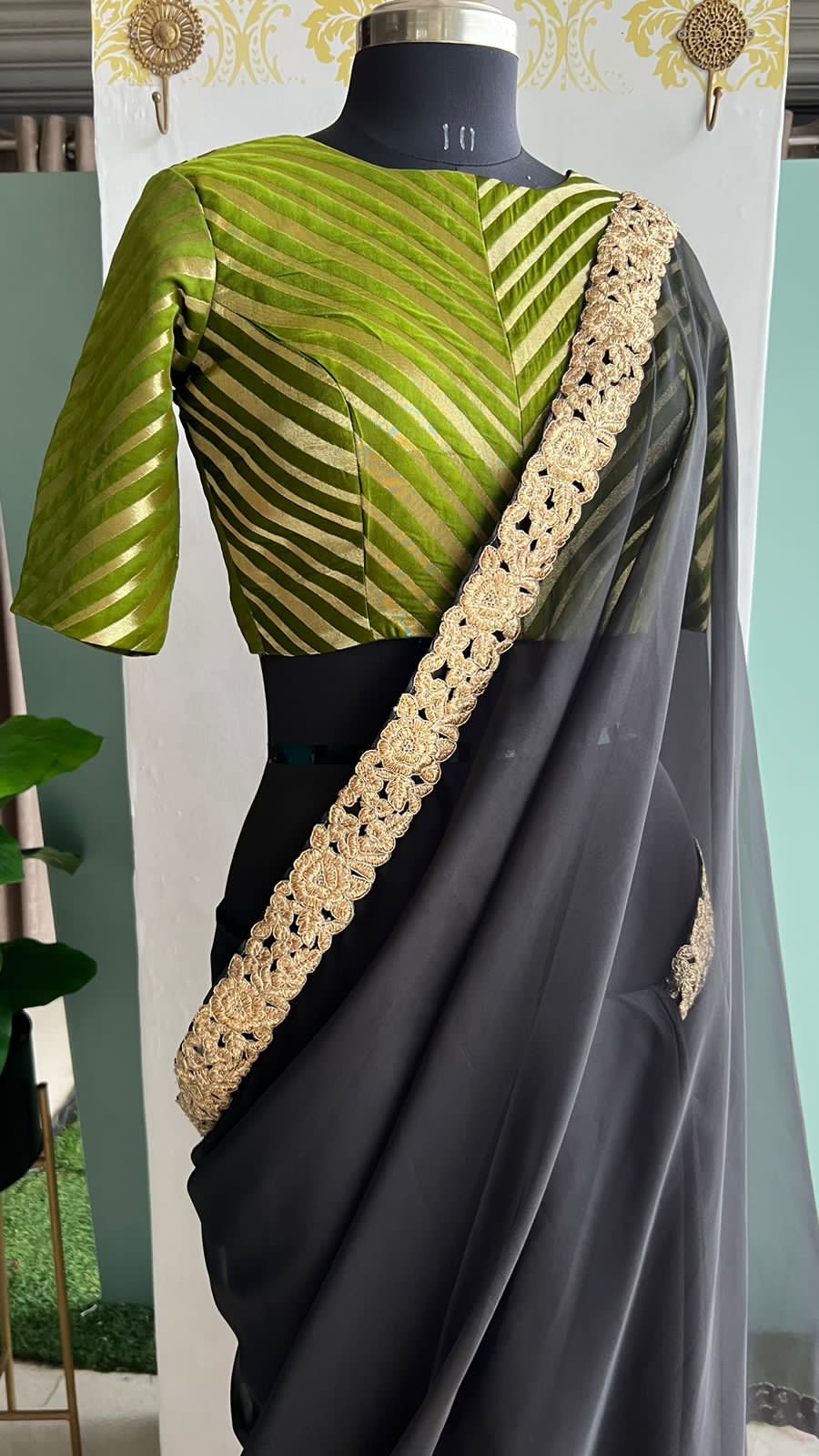 Black organza saree with olive banarasi blouse