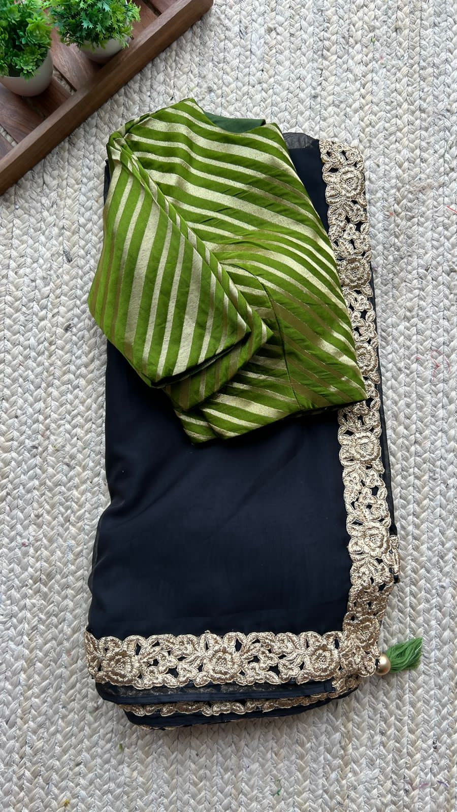 Black organza saree with olive banarasi blouse