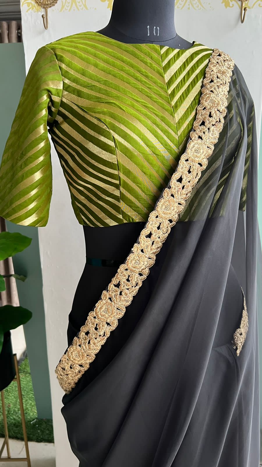 Black organza saree with olive banarasi blouse