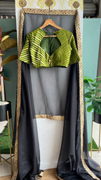 Black organza saree with olive banarasi blouse