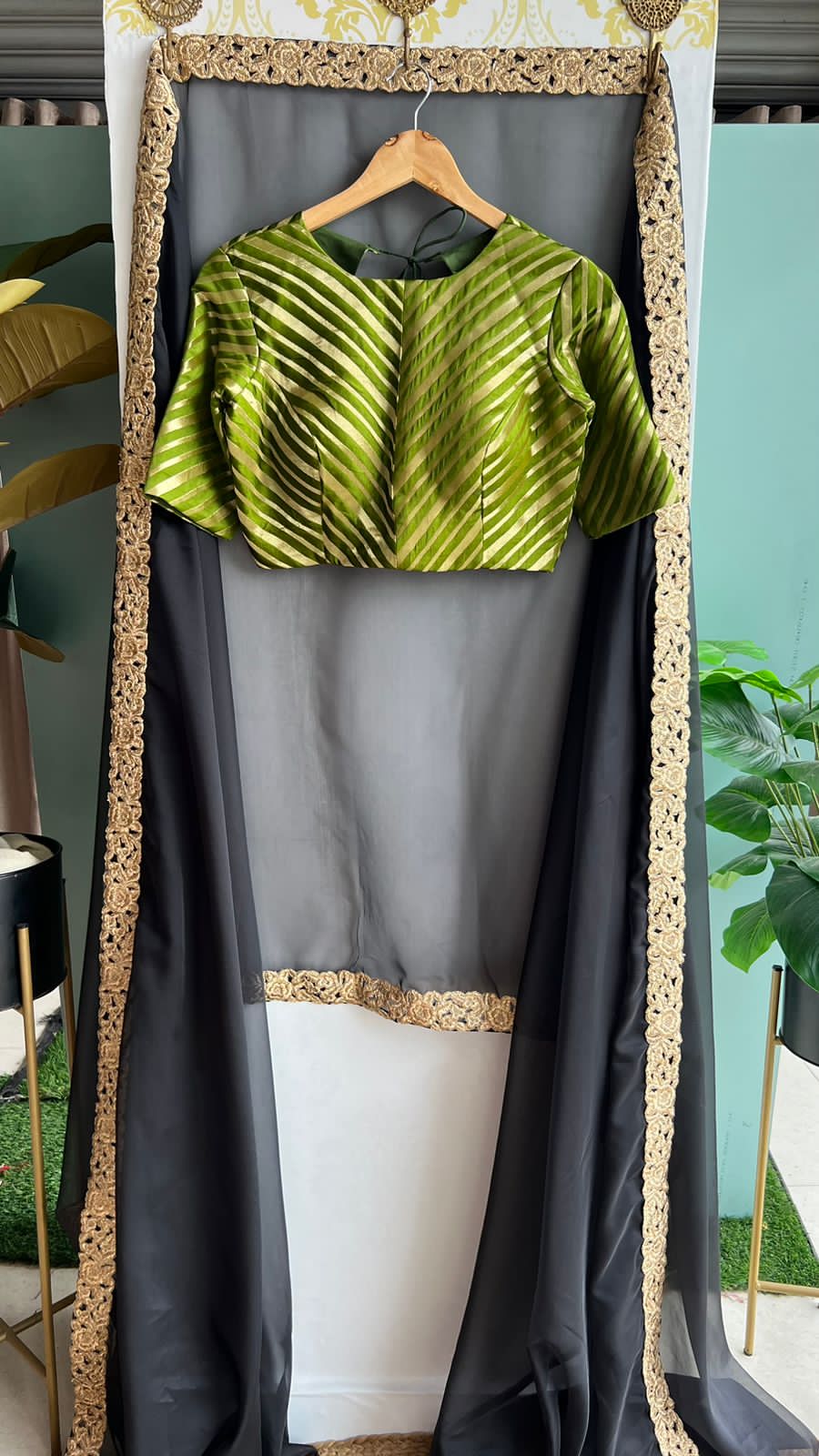 Black organza saree with olive banarasi blouse
