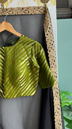Black organza saree with olive banarasi blouse