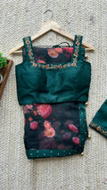 Bottle green organza saree with green handworked blouse