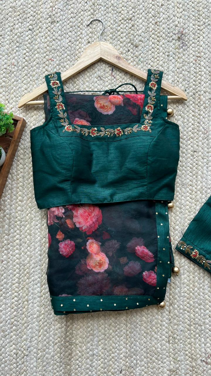 Bottle green organza saree with green handworked blouse