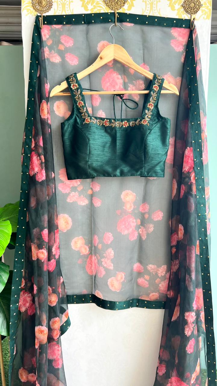 Bottle green organza saree with green handworked blouse