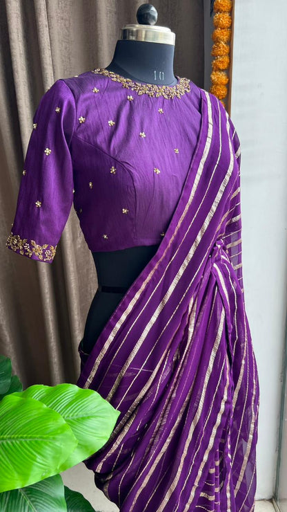 Purple georgette saree with purple handwork blouse