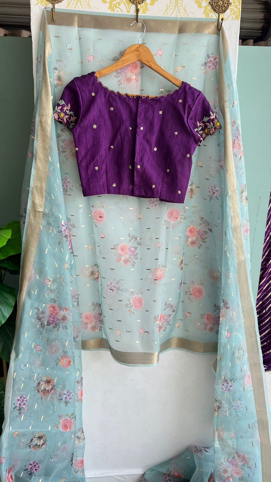 Blue organza saree with purple handwork blouse
