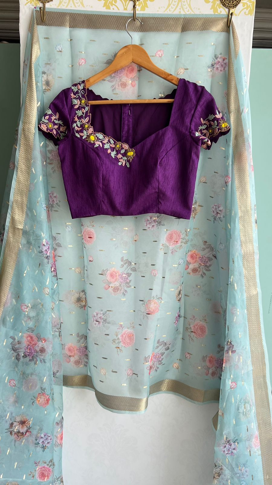 Blue organza saree with purple handwork blouse