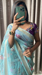 Blue organza saree with purple handwork blouse