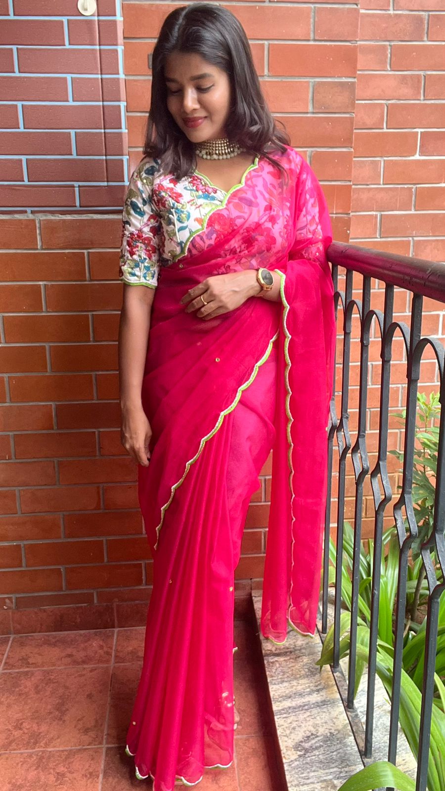 Fuchsia pink organza saree with hand worked blouse