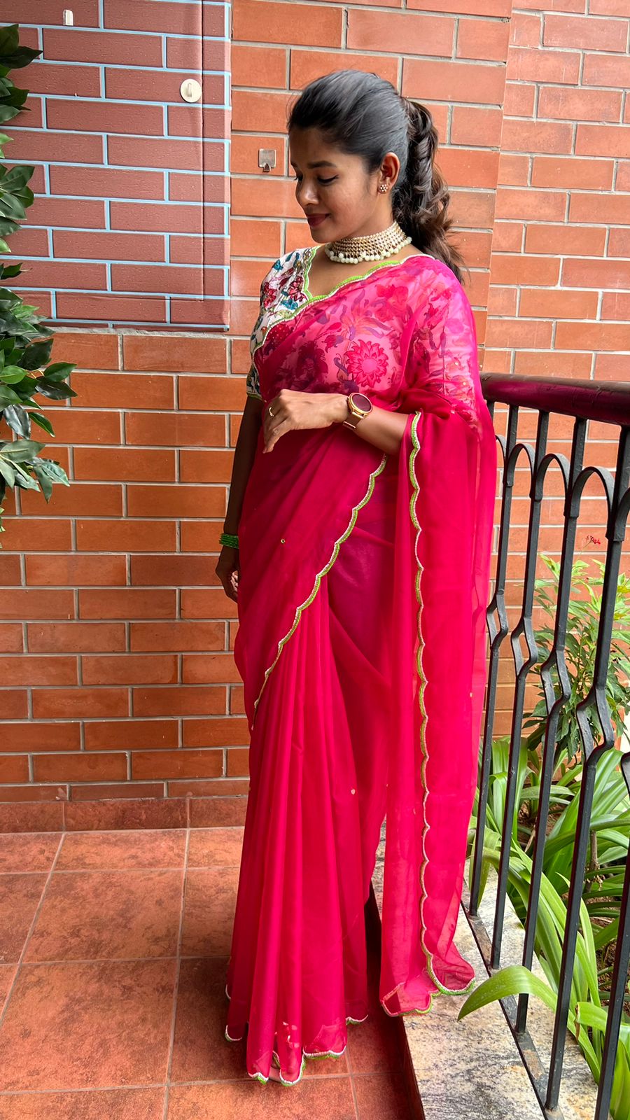 Fuchsia pink organza saree with hand worked blouse