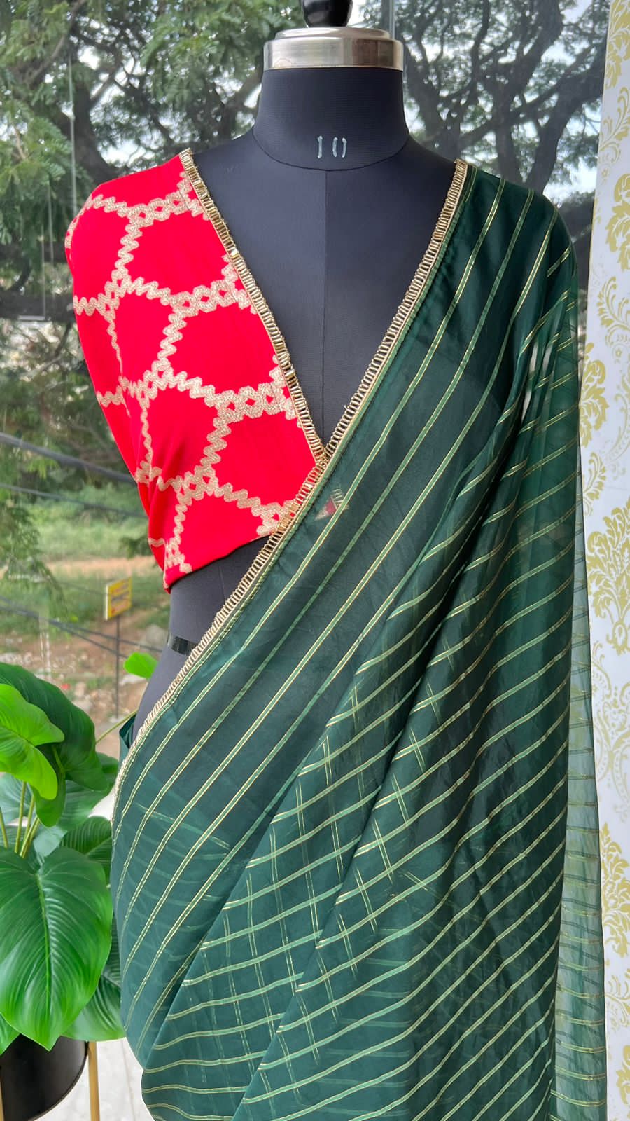 Green stripped organza saree with blouse