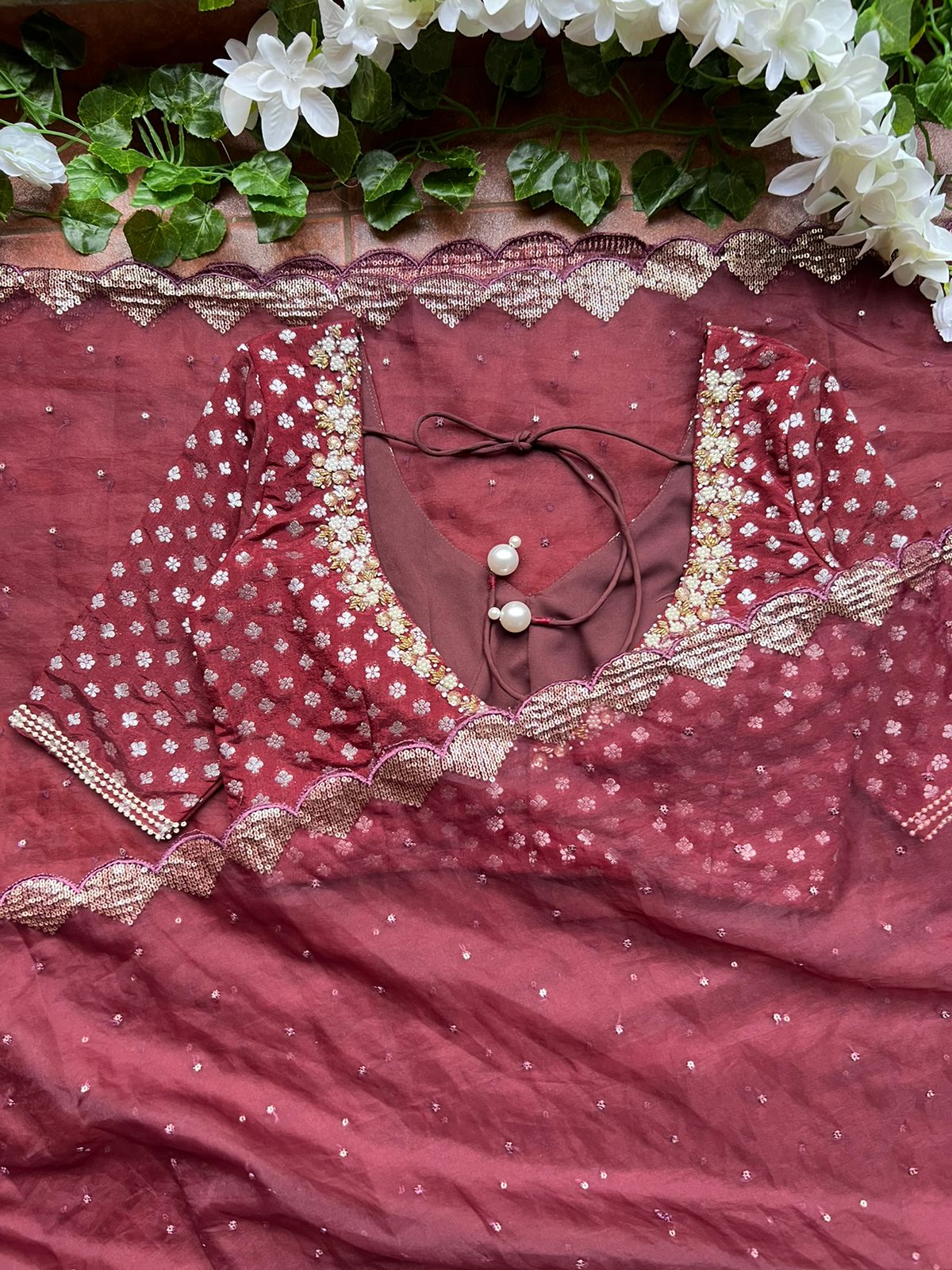 Maroon organza saree with banarasi handwork blouse