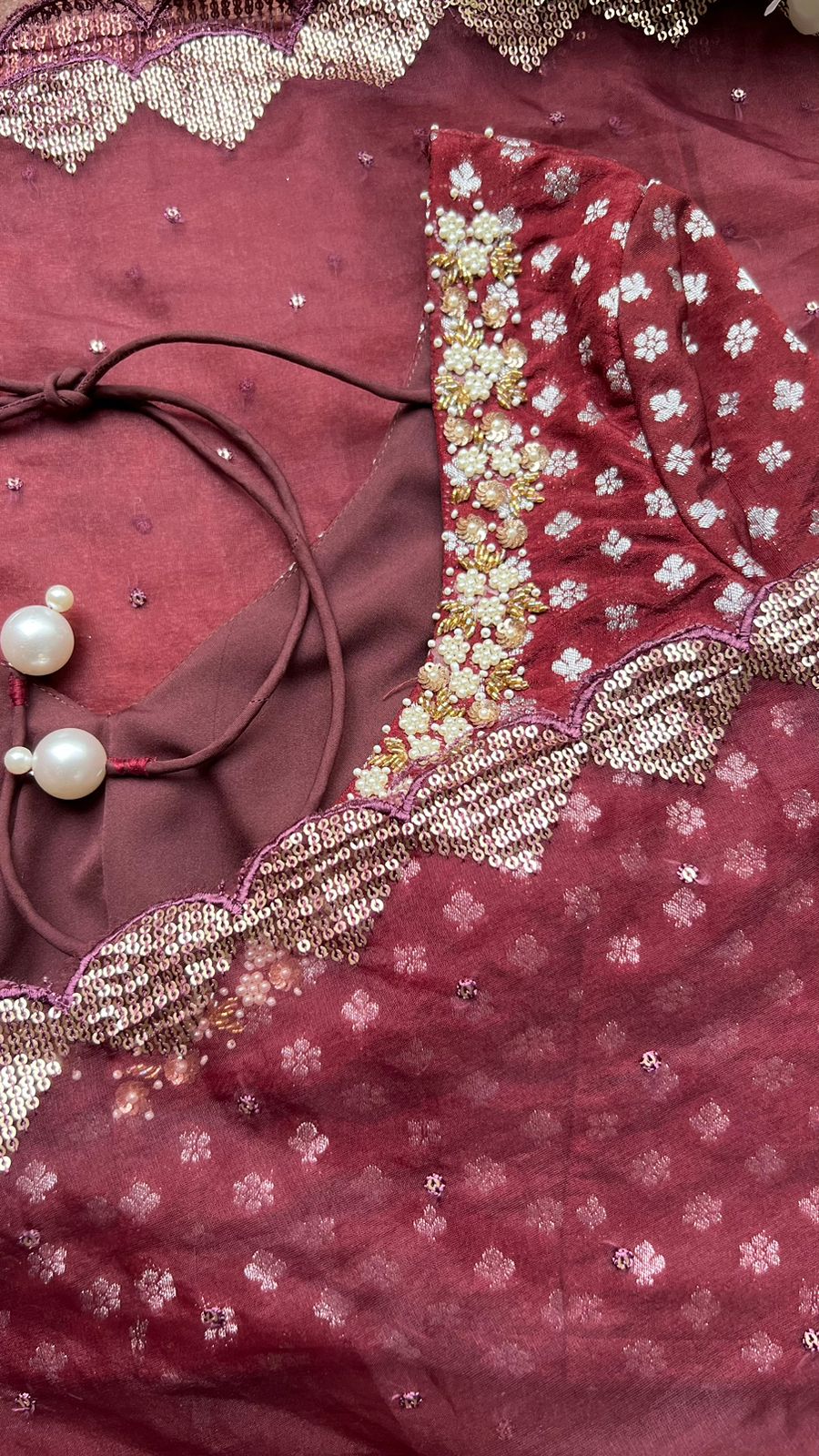 Maroon organza saree with banarasi handwork blouse