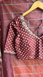Maroon organza saree with banarasi handwork blouse