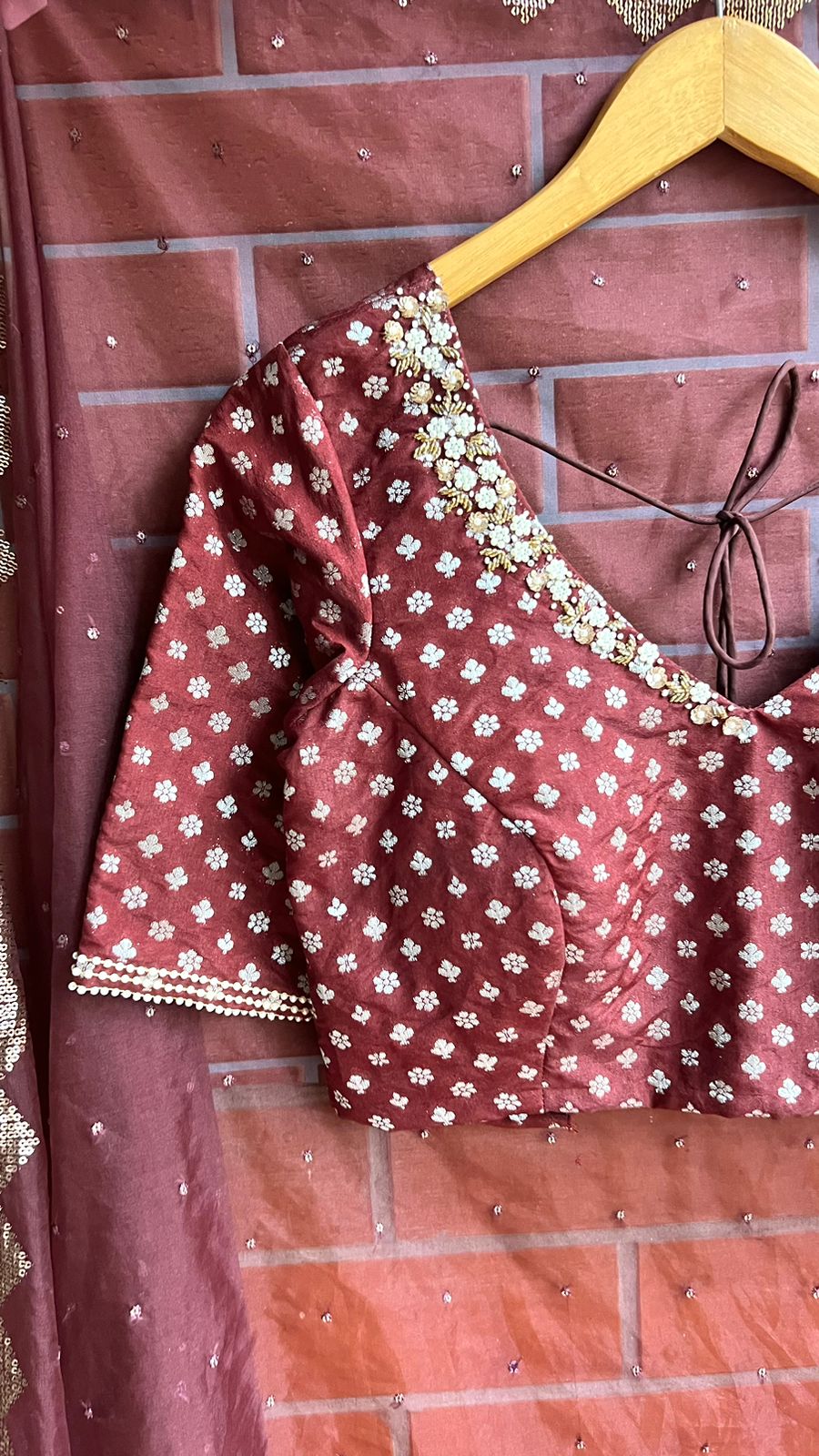Maroon organza saree with banarasi handwork blouse
