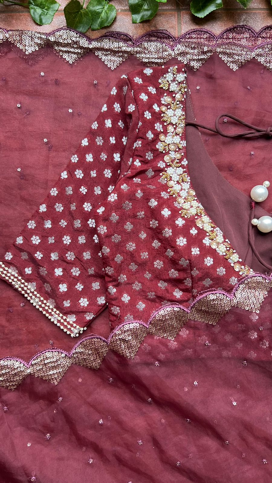 Maroon organza saree with banarasi handwork blouse