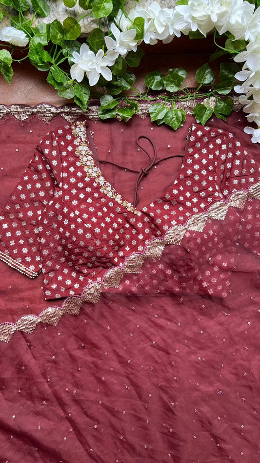Maroon organza saree with banarasi handwork blouse