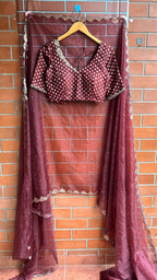 Maroon organza saree with banarasi handwork blouse