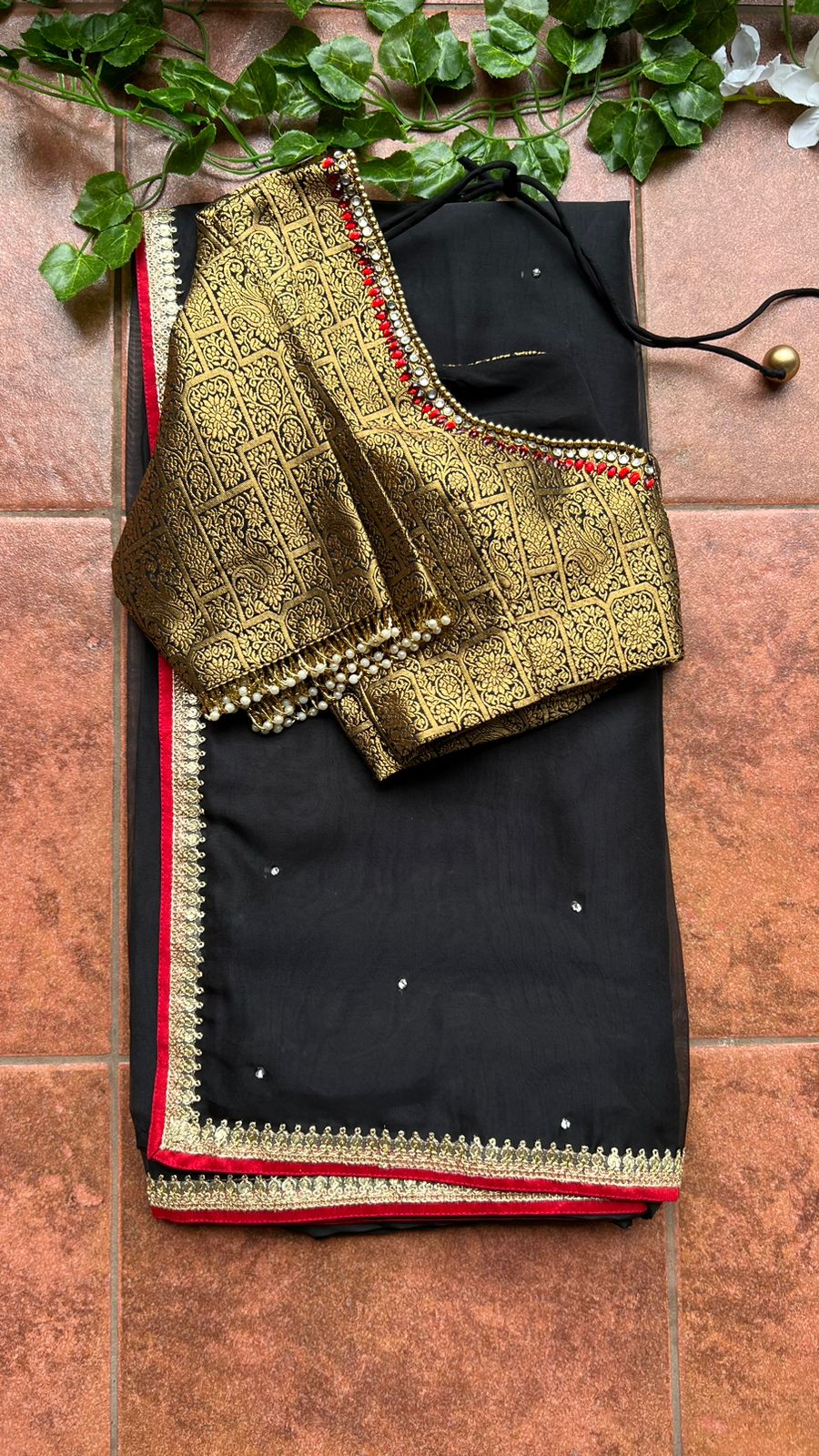 Black silk saree with kanjivaram handwork blouse
