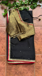 Black silk saree with kanjivaram handwork blouse