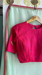 Mint soft organza saree with pink handwork blouse