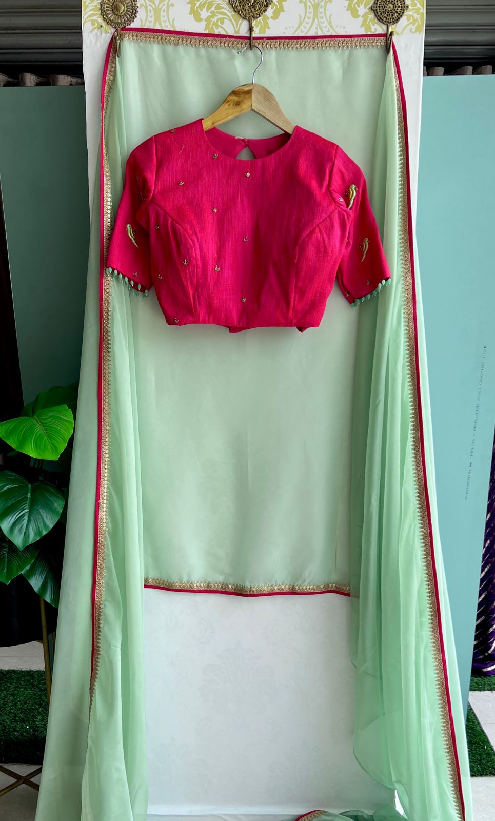 Mint soft organza saree with pink handwork blouse