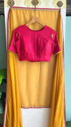 Mustard Yellow soft organza saree with pink handwork blouse