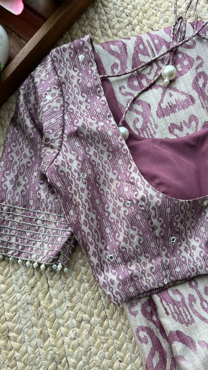 Wine and cream tussar saree with handwork blouse