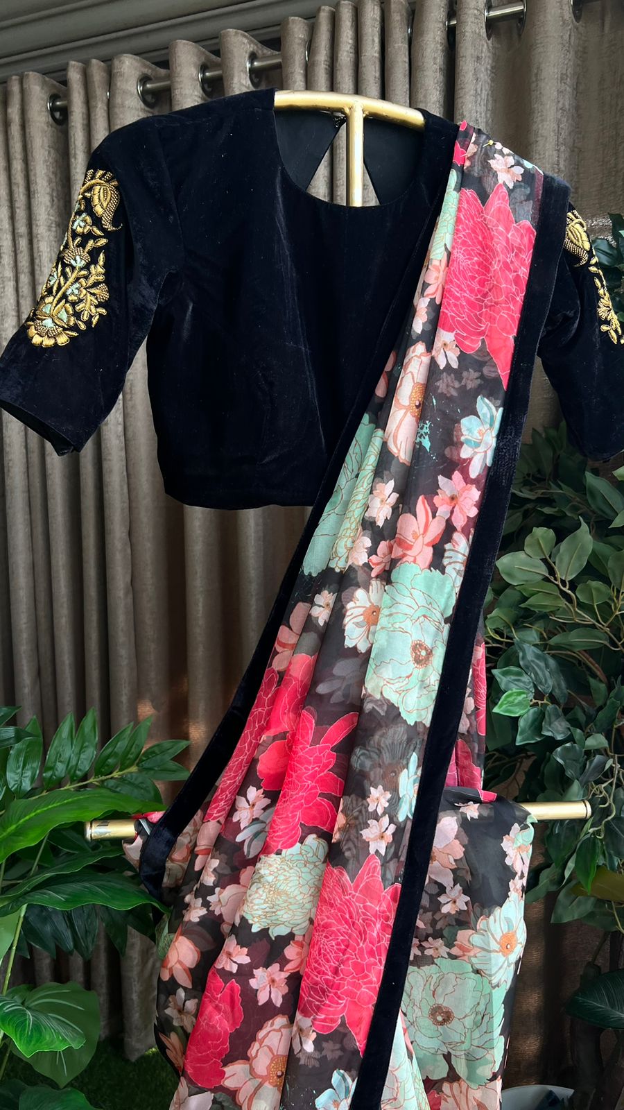 Floral organza saree with black handwork blouse