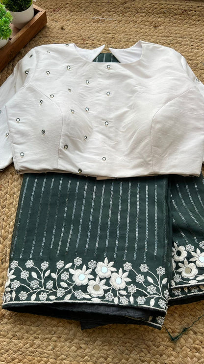 Green georgette saree with white mirror worked blouse