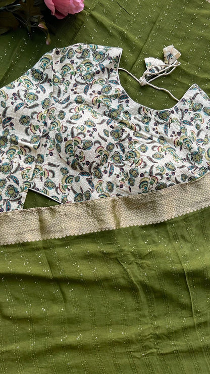 Green silk saree with white handwork blouse