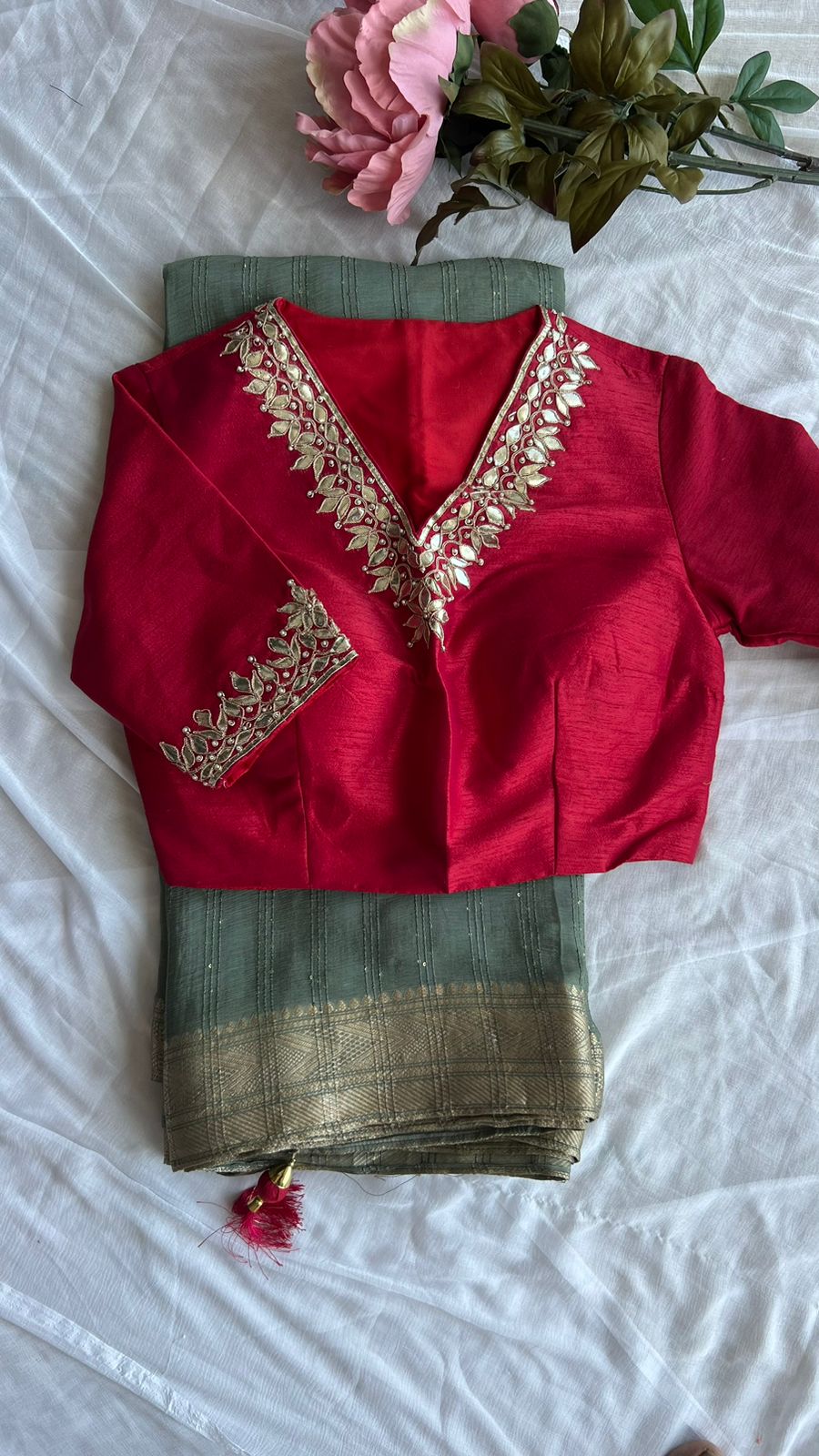 Grey chiffon saree with maroon handwork blouse