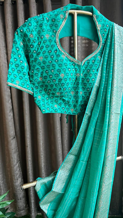 Tiffany blue chiffon saree with handwork blouse