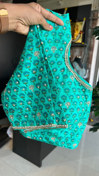 Turquoise blue chiffon saree with handwork blouse