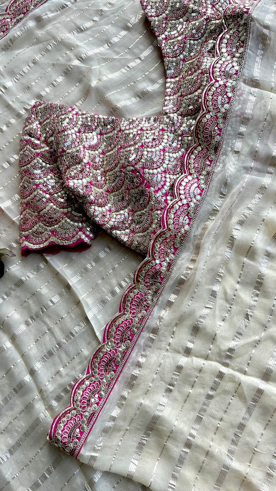 Cream chiffon saree with handworked blouse