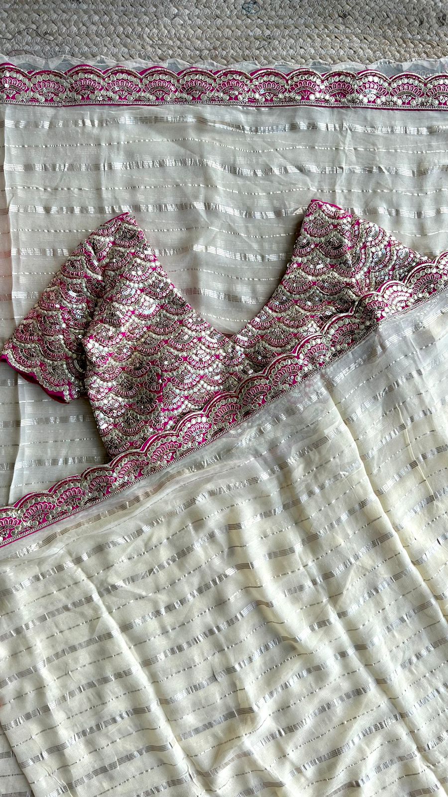 Cream chiffon saree with handworked blouse