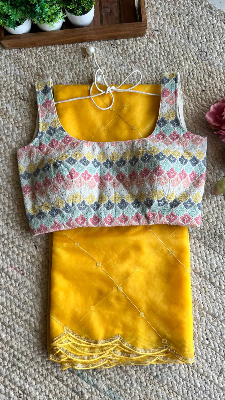 Yellow organza saree with cotton embroidery blouse