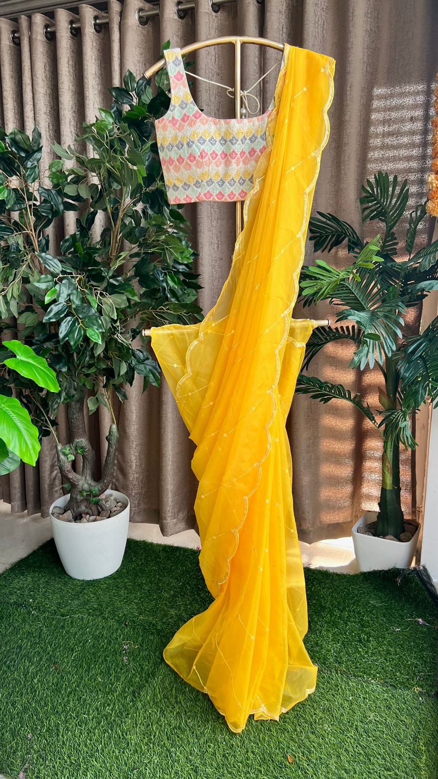 Yellow organza saree with cotton embroidery blouse