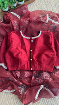 Deep maroon floral organza saree with hand worked blouse