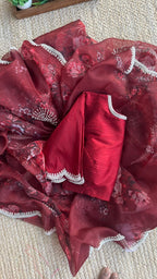 Deep maroon floral organza saree with hand worked blouse