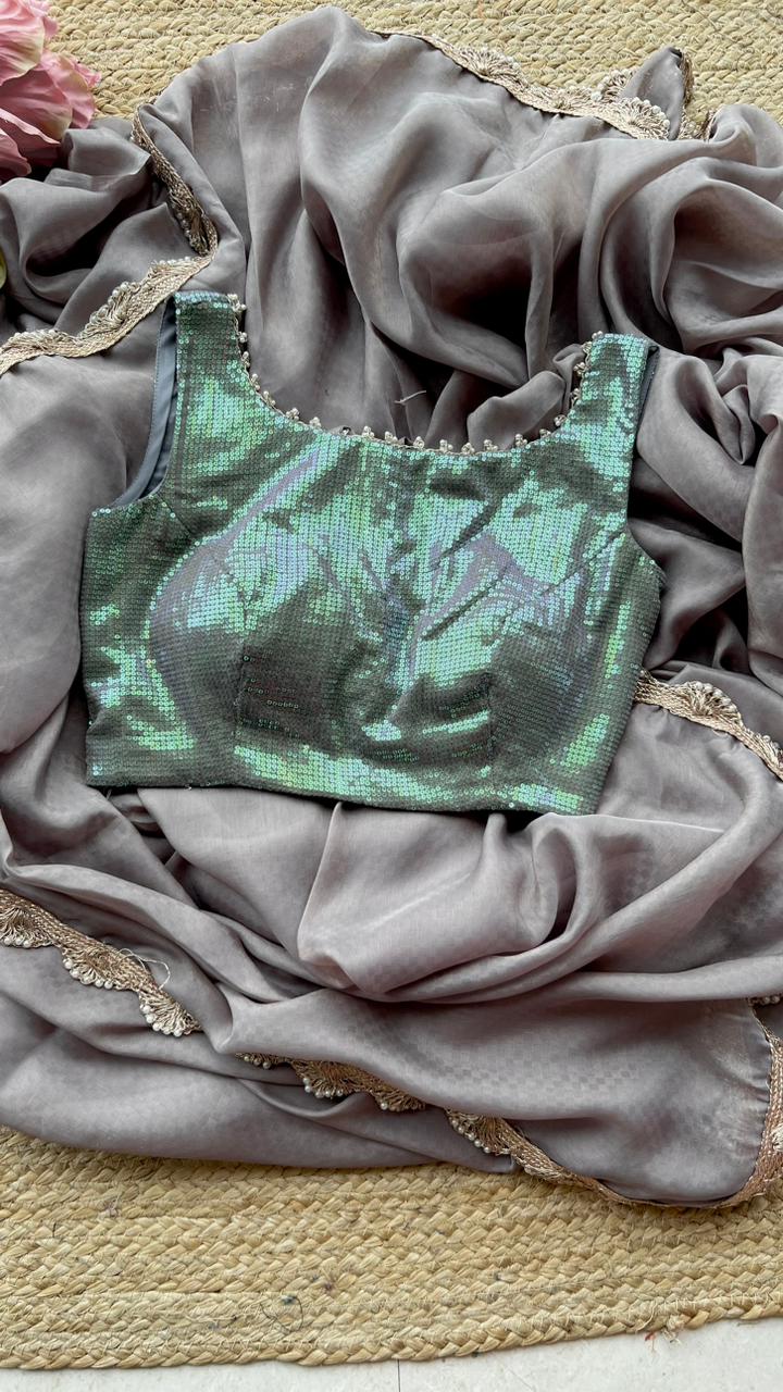 Grey georgette saree with sequins blouse