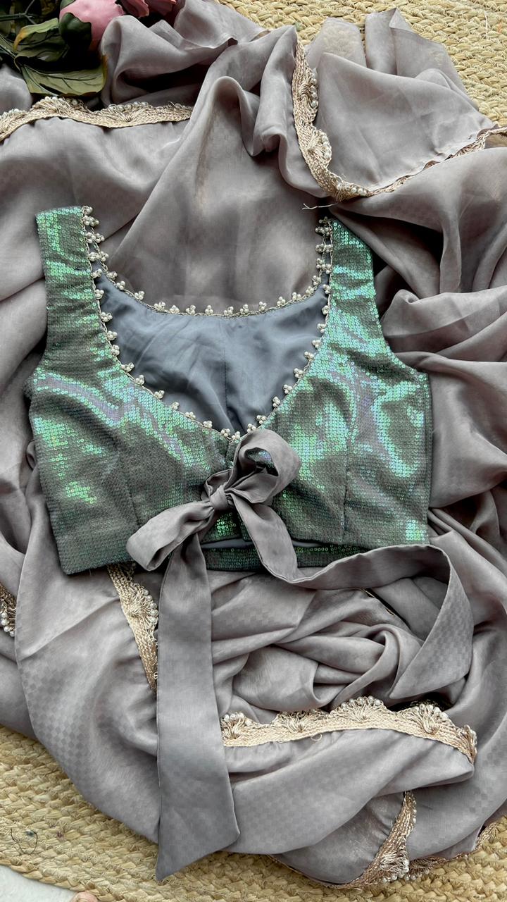 Grey georgette saree with sequins blouse