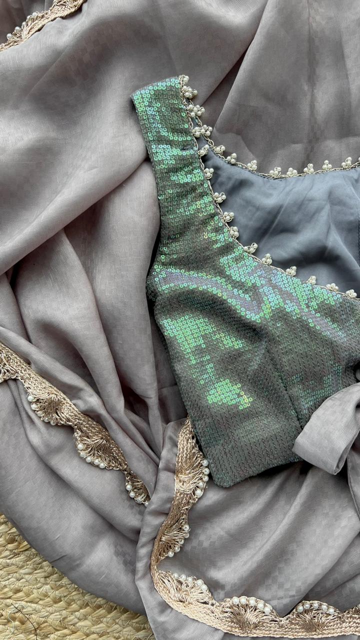 Grey georgette saree with sequins blouse