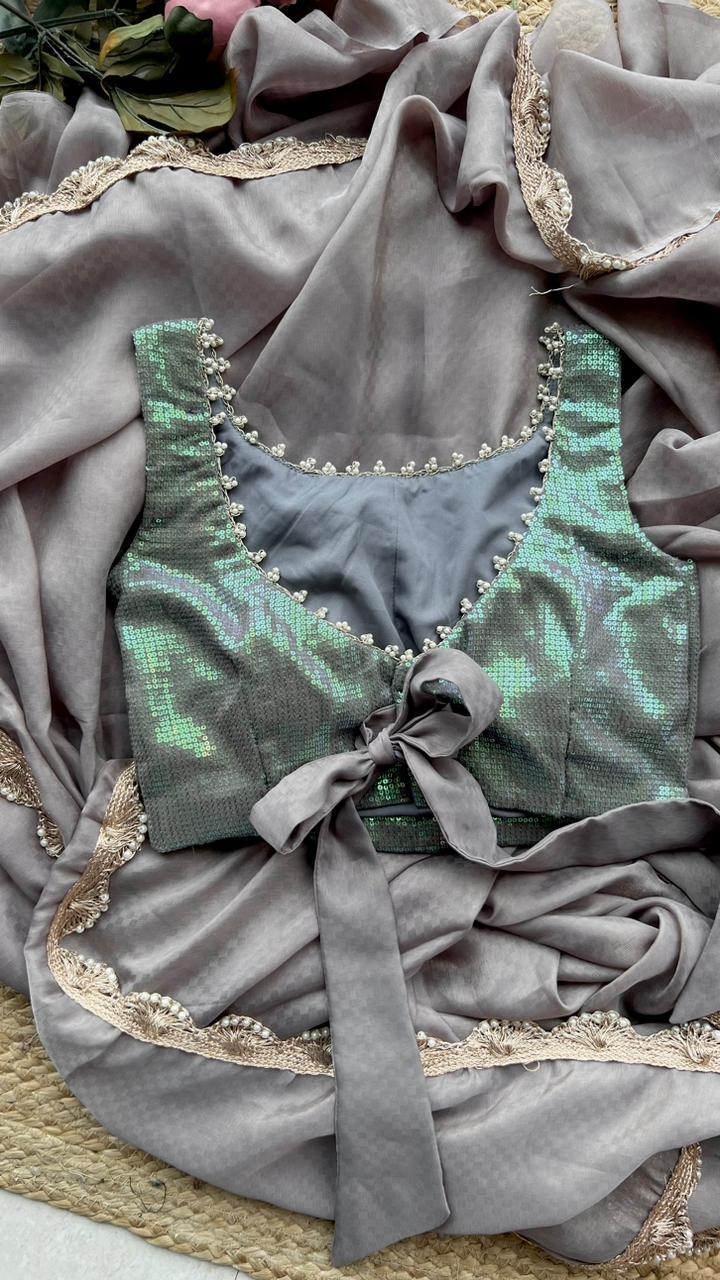 Grey georgette saree with sequins blouse
