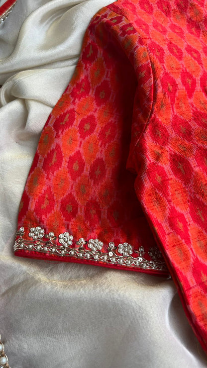 Gold tissue designer saree with Ikkat handwork blouse