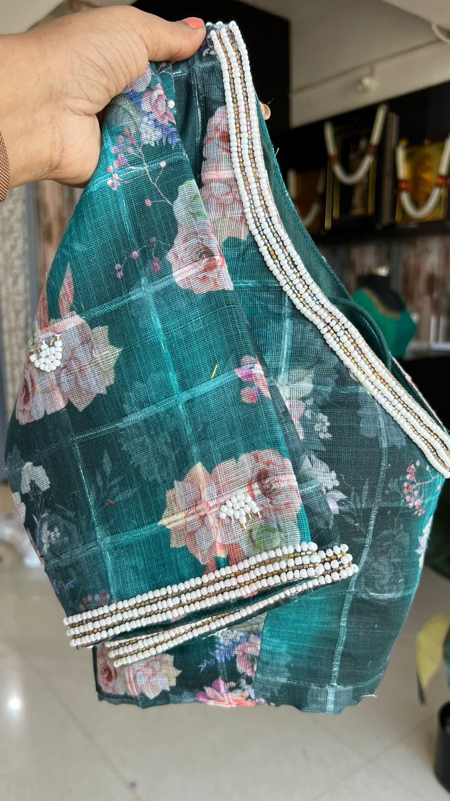Jute copper saree with floral pearl handwork blouse