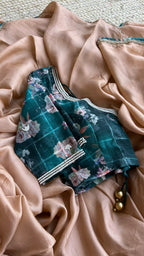 Jute copper saree with floral pearl handwork blouse