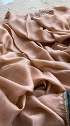 Jute copper saree with floral pearl handwork blouse